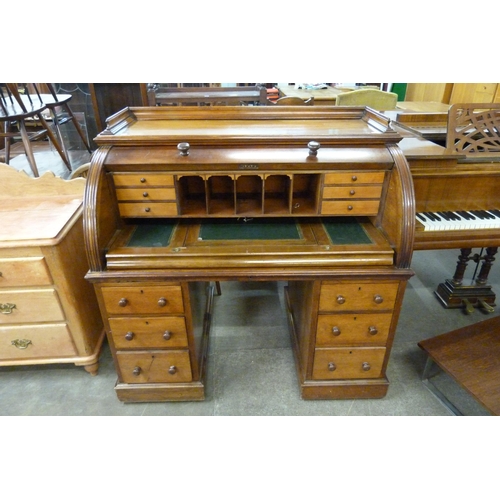 140 - A Victorian mahogany cylinder roll top desk