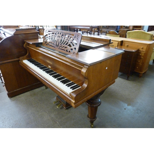 141 - An early 20th Century Beulhoff walnut Baby Grand piano. This lot is sold with non-transferable stand... 