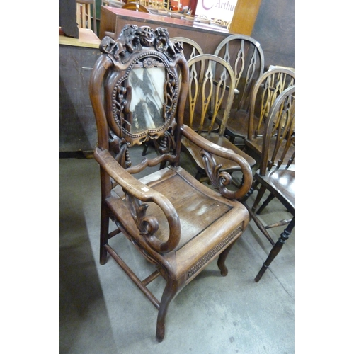 152 - A Chinese carved hardwood and marble armchair