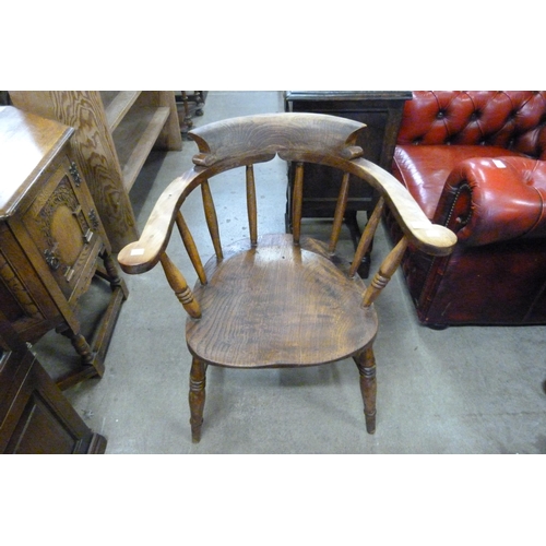 156 - A Victorian  elm and beech smokers bow chair