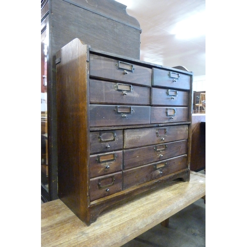 161 - An early 20th Century oak twelve drawer index cabinet