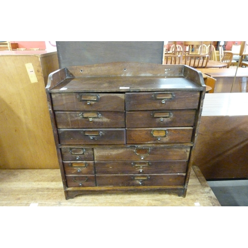 161 - An early 20th Century oak twelve drawer index cabinet