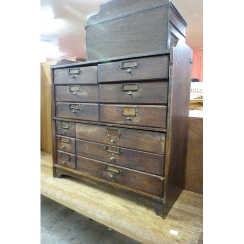 161 - An early 20th Century oak twelve drawer index cabinet