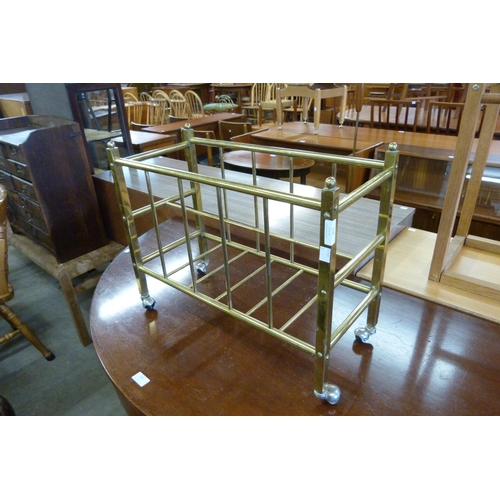 168 - An Italian brass magazine rack