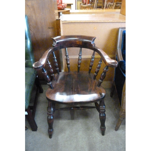 179 - A Victorian style beech smokers bow chair