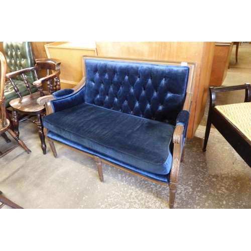 183 - A French carved beech and blue fabric upholstered canape settee