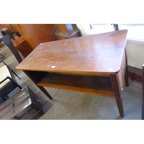 185 - A mahogany double sided open bookcase