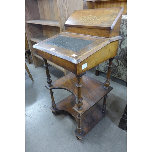 203 - A Victorian inlaid walnut Davenport top desk