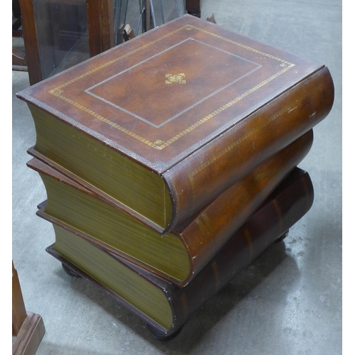 206 - A brown leather book shaped coffee table