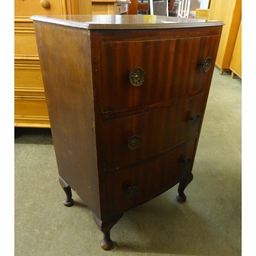 211 - A small mahogany bow front chest of drawers