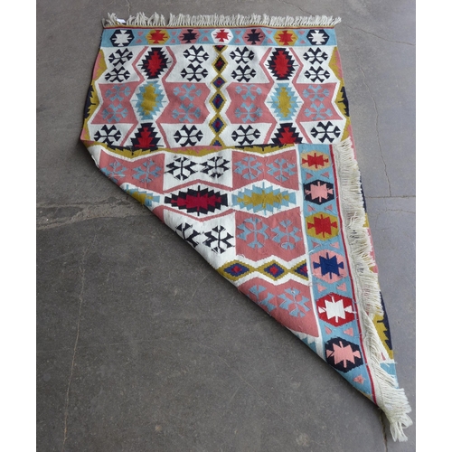 213 - A Turkish multi-coloured Kilim rug