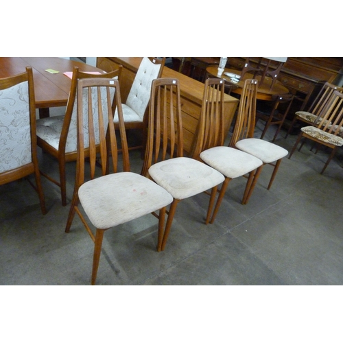 28 - A set of four Danish Koefoed Hornslet teak Eva chairs, designed by Niels Koefoed