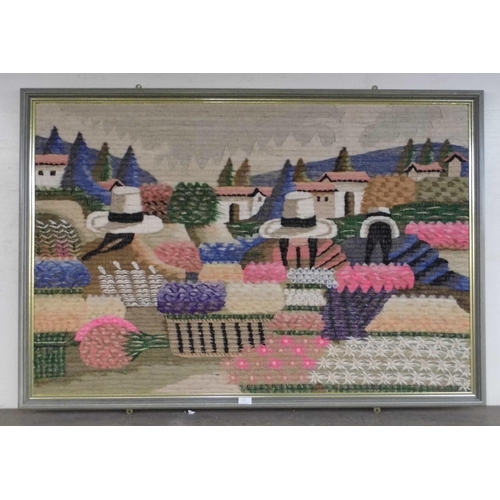 337 - A large woolwork tapestry, landscape, framed