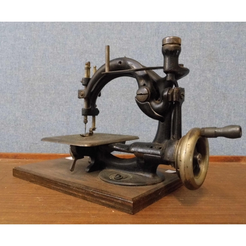 342 - A 19th Century Willcox & Gibbs cast iron sewing machine