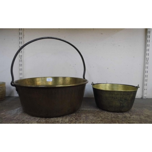 343 - Two Victorian brass jam pans