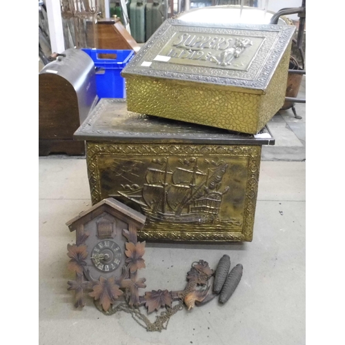 347 - A brass coal bin, a brass embossed slipper box and a cuckoo clock