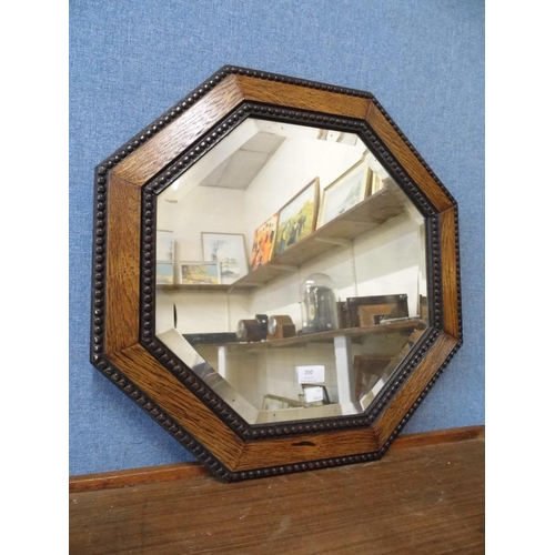 350 - An oak octagonal framed mirror