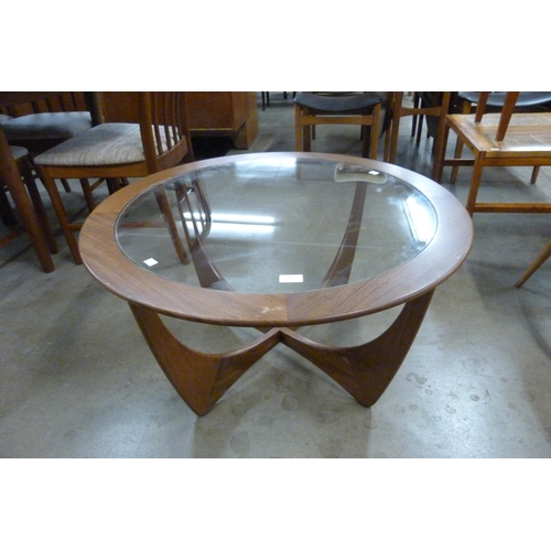 36 - A G-Plan Astro teak and glass topped circular coffee table