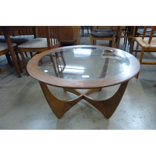 36 - A G-Plan Astro teak and glass topped circular coffee table