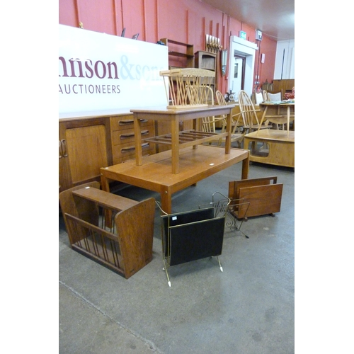 38 - Two teak coffee tables and four magazine racks