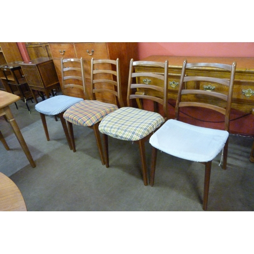 49 - A set of four Danish teak dining chairs