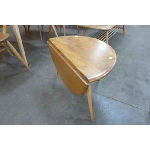 5 - An Ercol Blonde elm and beech 308 model drop-leaf occasional table