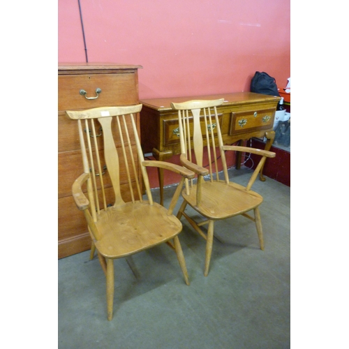 51 - A pair of Ercol style Blonde elm and beech chairs