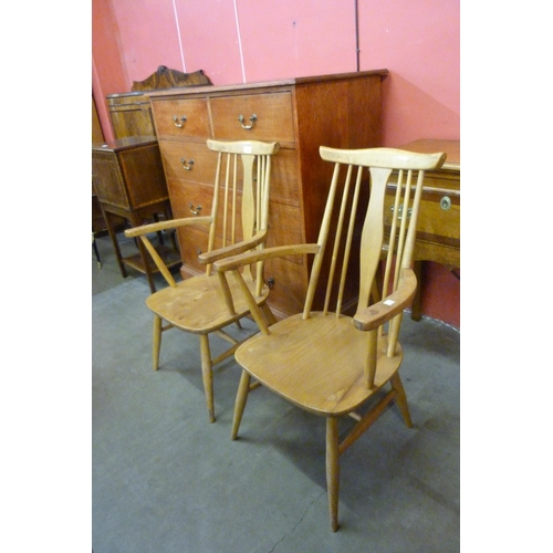 51 - A pair of Ercol style Blonde elm and beech chairs