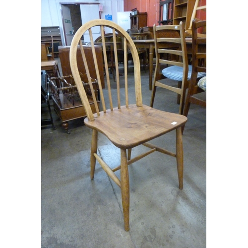 51A - A set of four Ercol elm and beech Windsor chairs