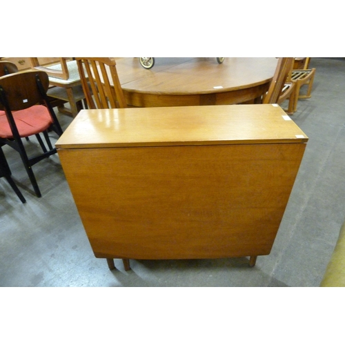 53 - A teak drop-leaf table