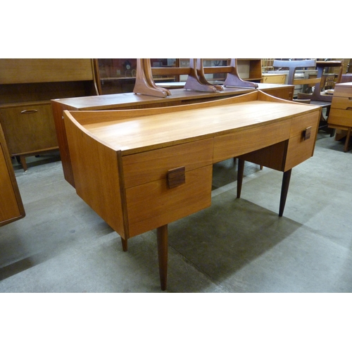 63 - A G-Plan Danish Design teak desk, designed by Ib Kofod Larsen