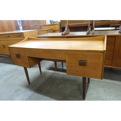 63 - A G-Plan Danish Design teak desk, designed by Ib Kofod Larsen