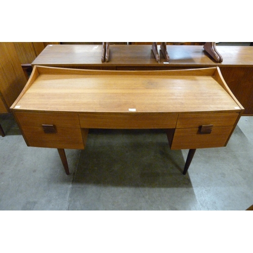 63 - A G-Plan Danish Design teak desk, designed by Ib Kofod Larsen