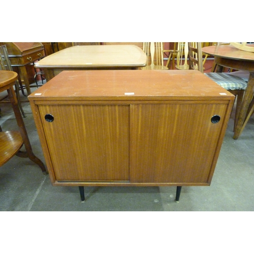 66 - A teak record cabinet