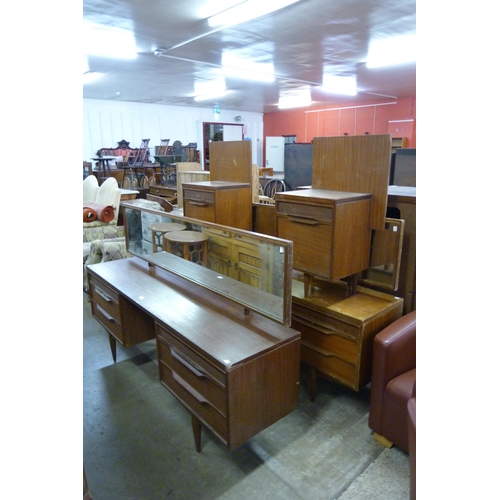 67 - Two White & Newton tola wood dressing tables and a pair of bedside tables