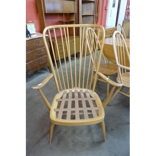 7 - An Ercol Blonde beech 478 model armchair