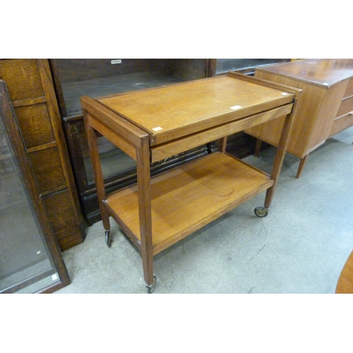 75 - A teak metamorphic trolley