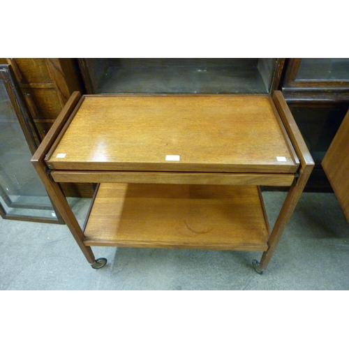 75 - A teak metamorphic trolley