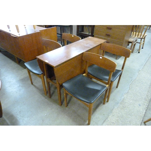 80 - A teak drop-leaf dining table and four chairs