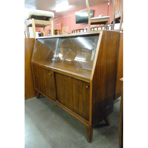 92 - A small walnut bookcase