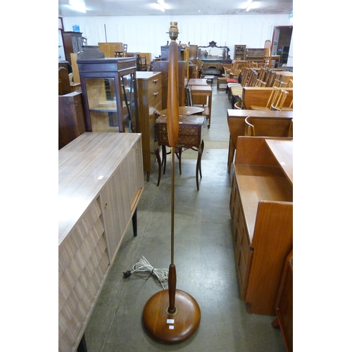 93 - A teak standard lamp