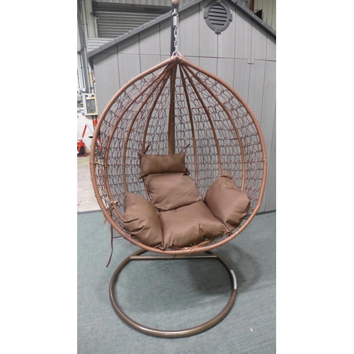 3045 - Swinging indoor/outdoor rattan and brown fabric egg chair   * This lot is subject to vat