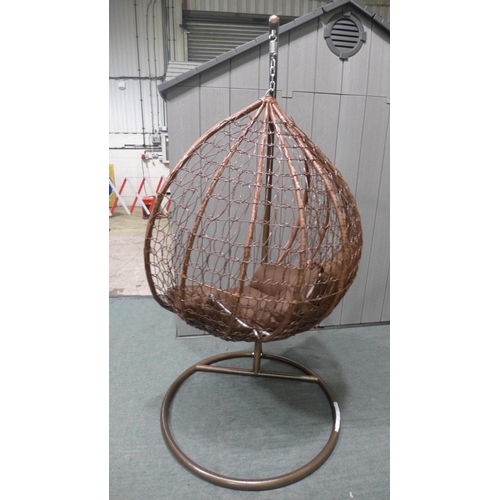 3046 - Swinging indoor/outdoor rattan and brown fabric egg chair   * This lot is subject to vat