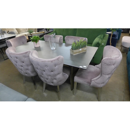 1301 - A grey ceramic top dining table with a set of six pink velvet dining chairs  *This lot is subject to... 