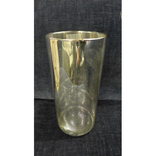 1303 - A silver and glass spiral patterned vase