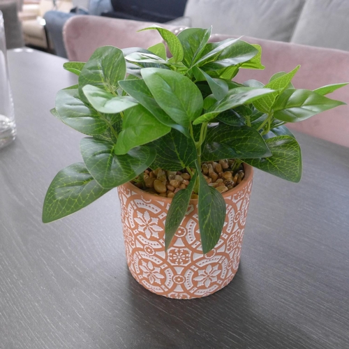 1335 - A faux green plant in a Moroccan tile pattern pot (63098104)