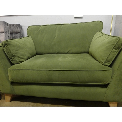 1345 - A winter green velvet love seat