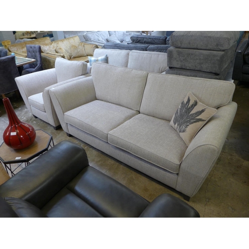 1415 - A champagne textured weave three seater sofa and armchair