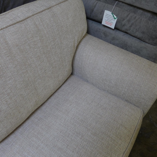 1416 - A champagne textured weave 2.5 seater sofa