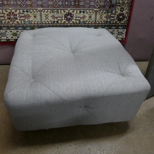 1426 - A grey upholstered buttoned footstool